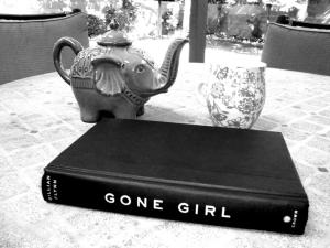 I read this on the back porch with the cutest tea pot ever :) 